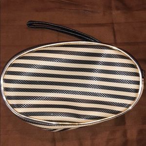 Black and cream striped cosmetic bag